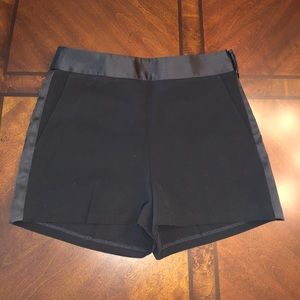 Women’s skirts and pair of shorts.
